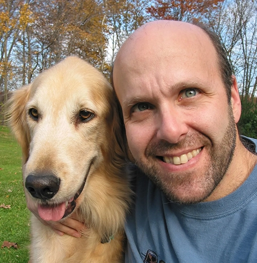 The inspiration behind RDH Software's name, Rusty the golden retreiver, with Mike Falk in 2005